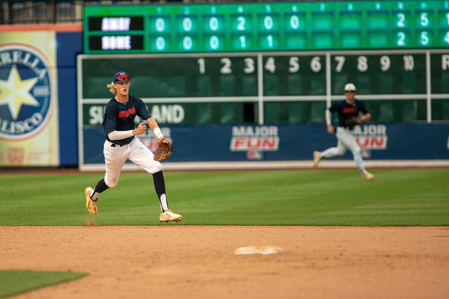 Drew Markle runs towards second base during Tuesday's GHBCA Senior All-Star game at Constellation Field in Sugar Land.